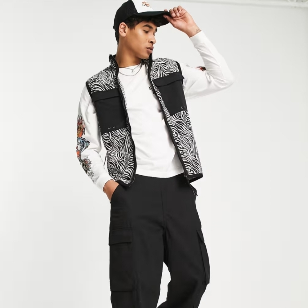 ASOS DESIGN festival vest jacket in all‎ over zebra print with pocket Size XL
